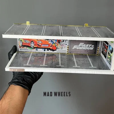 نمای بالا دیوراما گاراژ خودرو ۱:۶۴ مدل سریع و خشن