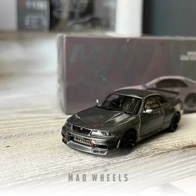 ماکت ماشین نیسان اسکای‌لاین Nissan Skyline GT-R (R33) برند مینی جی‌تی | مقیاس 1:64 - تصویر 5