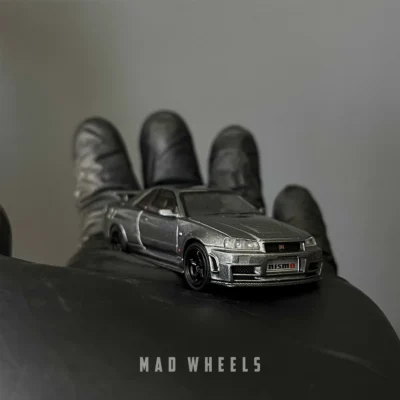 ماکت ماشین فلزی نیسان اسکای‌لاین R34 نیسمو | MINI GT 1160 Nissan Skyline GT-R NISMO BNR34 CRS | مقیاس ۱:۶۴ - تصویر 4