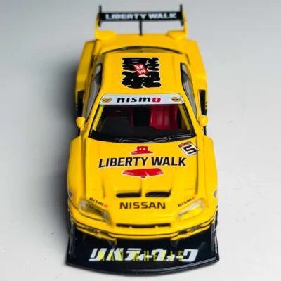 ماکت ماشین فلزی نیسان اسکای لاین R34 سوپر سیلوئت لیبرتی واک زرد | Nissan LB-ER34 Super Silhouette Skyline Sport Yellow | MINI GT 1182 | مقیاس 1:64 - Image 5