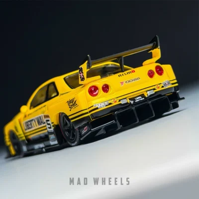 ماکت ماشین فلزی نیسان اسکای لاین R34 سوپر سیلوئت لیبرتی واک زرد | Nissan LB-ER34 Super Silhouette Skyline Sport Yellow | MINI GT 1182 | مقیاس 1:64 - Image 3